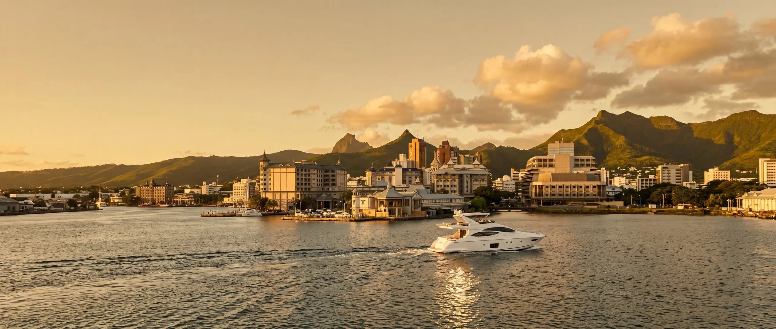 A yacht on the open water off Caudan Waterfront